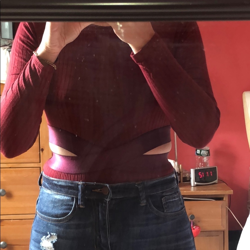 Never worn Free People burgundy bodysuit size M